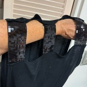 BLACK TOP W 3 STRAND SEQUINS FROM TOP TO DOWN SLEEVES 23”P 26” L